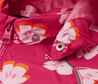 Close up hood snap buttons of Reima Reimatec Waterproof Jacket - Hete - Bright Berry. Available at www.tenlittle.com