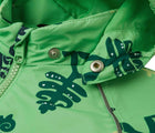Close up hood snap buttons of Reima Reimatec Waterproof Jacket - Hete - Summer Green. Available at www.tenlittle.com