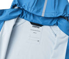 Close up name tag of Reima - Waterproof Rain Jacket - Denim Blue - Available at www.tenlittle.com