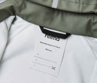 Close up name tag of Reima - Waterproof Rain Jacket - Greyish Green - Available at www.tenlittle.com