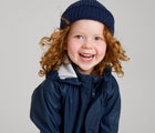 Child wearing Reima - Waterproof Rain Jacket - Navy - Available at www.tenlittle.com