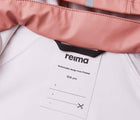 Close up name tag of Reima - Waterproof Rain Jacket - Rose Blush - Available at www.tenlittle.com