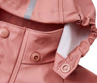 Close up hood snap of Reima - Waterproof Rain Jacket - Rose Blush - Available at www.tenlittle.com