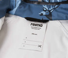 Close up interior ID tag of Reima Waterproof Rain Jacket - Vesi - Blue Ocean. Available at www.tenlittle.com