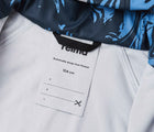 Close up interior ID tag of Reima Waterproof Rain Jacket - Vesi - Denim Blue. Available at www.tenlittle.com