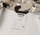 Close up ID tag of Reima Waterproof Rain Jacket - Vesi - Earthy Beige. Available at www.tenlittle.com