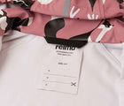 Close up interior ID tag of Reima Waterproof Rain Jacket - Vesi - Rose Blush. Available at www.tenlittle.com