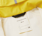 Close up name tag of Reima - Waterproof Rain Jacket - Yellow - Available at www.tenlittle.com