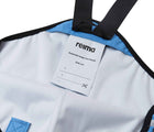 Close up name tag of Reima - Lammikko Waterproof Rain Pants - Denim Blue - Available at www.tenlittle.com