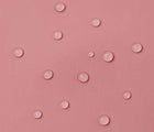 Close up waterproof material of Reima - Lammikko Waterproof Rain Pants - Rose Blush - Available at www.tenlittle.com