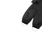 Close up elastic leg ends and silicone foot loops of Reima - Waterproof Reimatec Snowsuit - Gotland - Black - Available at www.tenlittle.com