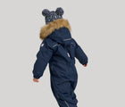 Back view of child wearing Reima - Waterproof Reimatec Snowsuit - Gotland - Navy - Available at www.tenlittle.com