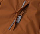 Close up zip pocket of Reima - Waterproof Reimatec Snowsuit - Gotland - Cinnamon Brown - Available at www.tenlittle.com