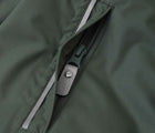 Close up zip pocket of Reima - Waterproof Reimatec Snowsuit - Gotland - Thyme Green - Available at www.tenlittle.com