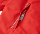 Close up zip pocket of Reima - Waterproof Reimatec Snowsuit - Gotland - Tomato Red - Available at www.tenlittle.com