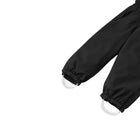 Close up foot loops of Reima - Waterproof Reimatec Winter Pants - Juoni - Black - Available at www.tenlittle.com