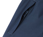 Close up zip pocket of Reima - Waterproof Reimatec Winter Pants - Juoni - Navy - Available at www.tenlittle.com