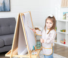 Child painting in the Bumkins Wander Long Sleeved Bib. Available from www.tenlittle.com.