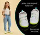 Split view of child and close up features of Ten Little Everyday Original - Neon Glow - Neon Green. Available at www.tenlittle.com