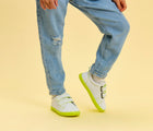 Child wearing Ten Little Everyday Original - Neon Glow - Neon Yellow. Available at www.tenlittle.com