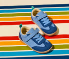 Top and side view of Ten Little Retro Suede Sneakers on rainbow background - Retro Blue. Available at www.tenlittle.com