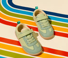 Top view of Ten Little Retro Suede Sneakers on rainbow background  - Retro Green. Available at www.tenlittle.com