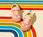 Top view of Ten Little Retro Suede Sneakers on rainbow background - Retro Pink. Available at www.tenlittle.com