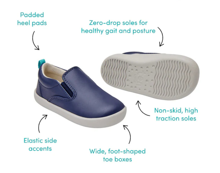 Front and bottom of shoe view and features of Ten Little Slip-On Sneakers - Navy Blue. Available at www.tenlittle.com