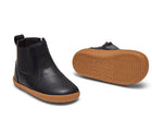 Front and bottom of shoe view of Ten Little Chelsea Boots - Classic Black. Available at www.tenlittle.com