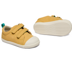 Side and bottom of shoe view of Ten Little Eco Canvas Sneakers - Mellow Yellow. Available at www.tenlittle.com