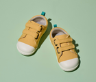 Top view of Ten Little Eco Canvas Sneakers - Mellow Yellow. Available at www.tenlittle.com