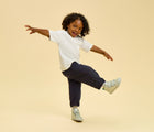 Child wearing Ten Little Everyday High Top - Moondust Silver. Available at www.tenlittle.com