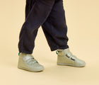 Child wearing Ten Little Everyday High Top - Moondust Silver. Available at www.tenlittle.com
