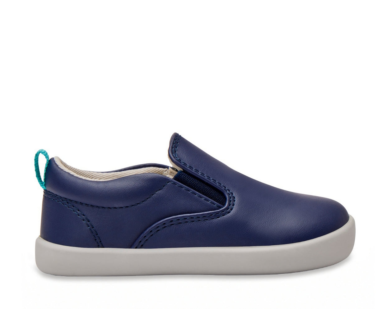Side view of Ten Little Slip-On Sneakers - Navy Blue. Available at www.tenlittle.com