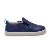 Side view of Ten Little Slip-On Sneakers - Navy Blue. Available at www.tenlittle.com