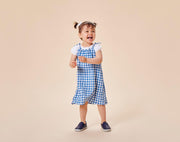Child wearing Ten Little Slip-On Sneakers - Navy Blue. Available at www.tenlittle.com