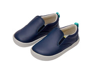 Side and front view of Ten Little Slip-On Sneakers - Navy Blue. Available at www.tenlittle.com