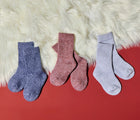 Side view of Ten Little Cozy Socks on furry background - Assorted Color Pack - Navy, Gray, Rust. Available at www.tenlittle.com
