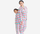 Adult with child wearing Primary Holiday PJ Set - Peppermint Plaid - Ivory Multi Plaid. Available at www.tenlittle.com