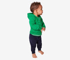 Baby wearing Primary Baby French Terry Jogger in Navy - 2 Pack - Navy / Cherry. Available at www.tenlittle.com