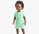 Child wearing Primary Baby Henley Romper - Clover. Available at www.tenlittle.com