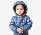 Child wearing Primary Baby Lightweight Puffer Jacket - Dusk. Available at www.tenlittle.com