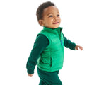 Baby wearing Primary Baby Lightweight Puffer Vest - Green Bean. Available at www.tenlittle.com