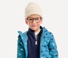 Child wearing Primary - Cotton Beanie - Oat - Available at www.tenlittle.com