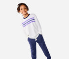 Boy wearing Primary - Fleece Jogger - Heather Navy - Available at www.tenlittle.com