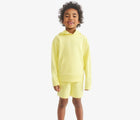Child wearing Primary Gym Shorts - Buttercup. Available at www.tenlittle.com