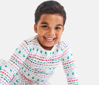 Child wearing Primary Holiday PJ Set - Merry Ribbons - Ivory Multi Fairisle. Available at www.tenlittle.com