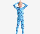 Child wearing Primary Holiday PJ Set - Snowy Reindeer - Cornflower Reindeer. Available at www.tenlittle.com