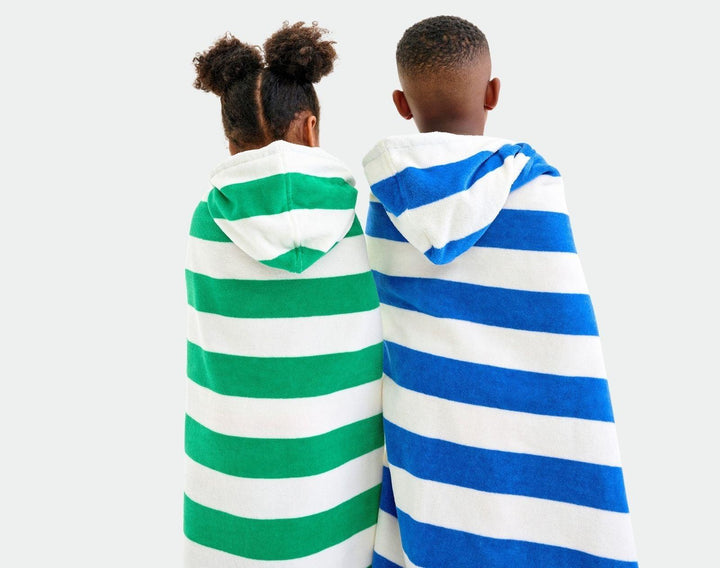 Kids wearing Primary Hooded Towel - Assorted Colors. Available at www.tenlittle.com