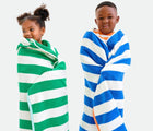 Kids wearing Primary Hooded Towel - Assorted Colors. Available at www.tenlittle.com